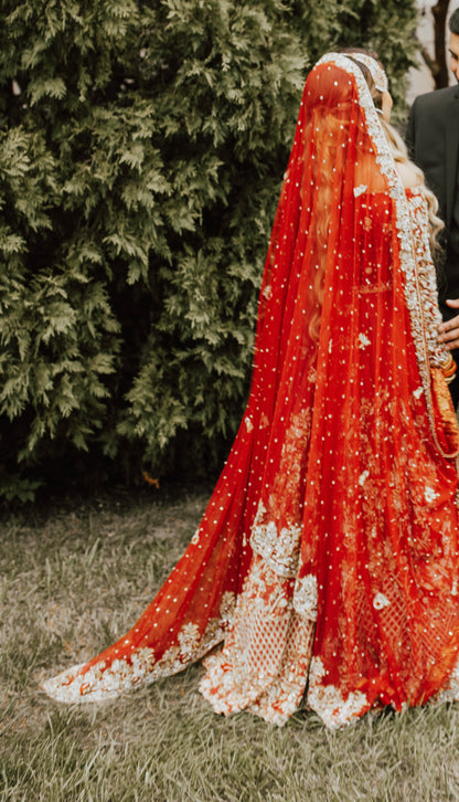 Red Wedding Lehenga By The Luxurious